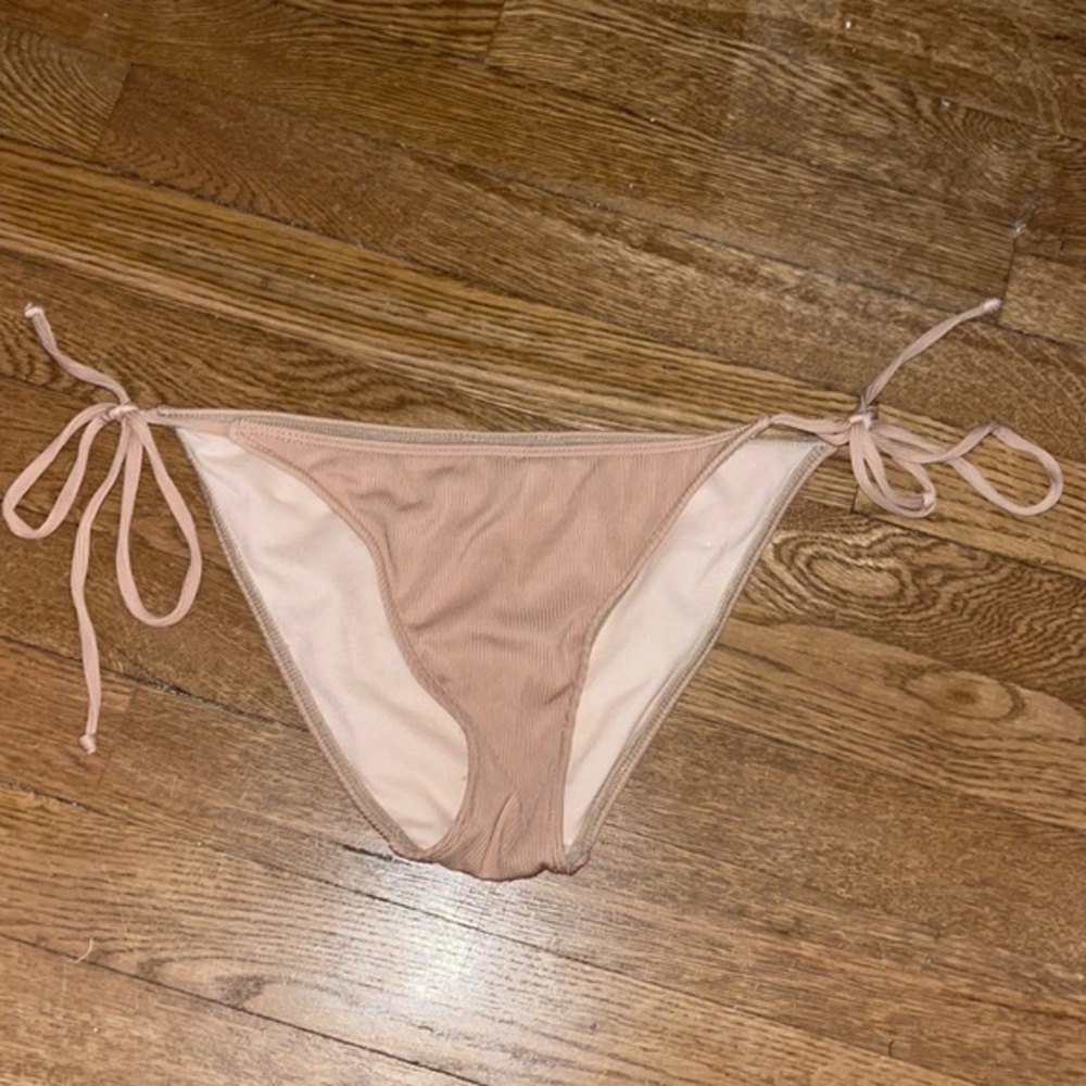 Nude string bikini bottom